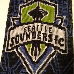 Seattle Sounders FC scarf with fringe.